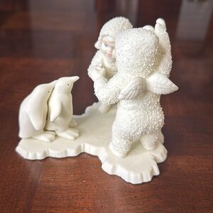 Deptartment 56 Snowbabies Playing Games is Fun Christmas Penguins Figurine